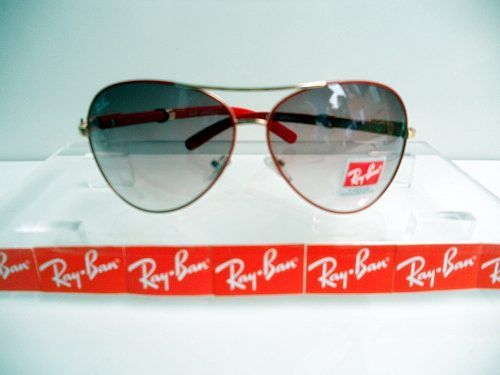 Ray Ban 3028 - Armação Dourada com detalhe vermelho!